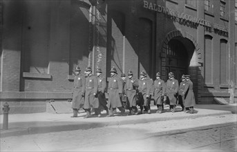 Police patrol marching outside Baldwin Locomotive Works, Philadelphia, 1910. Creator: Bain News Service.