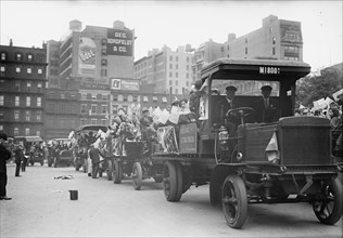 Orphans going to Coney Island in Autos, 1911. Creator: Bain News Service.