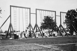 Rings and poles, Bronx Park, 1911. Creator: Bain News Service.