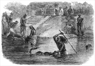 Hindoo bathers in the River Jumna surprised by a snake, 1864. Creator: J. A. B..