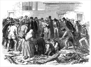 The Flood at Sheffield: searching for the dead in the cellar of a ruined house at Neepsend, 1864. Creator: Unknown.