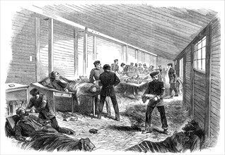 The War in Denmark: temporary field hospital...scene in the amputating hut..., 1864. Creator: Unknown.