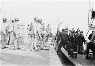 Loading MEADE, 1913. Creator: Bain News Service.