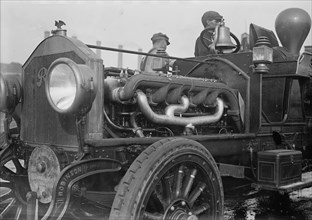 Under the hood of the motor fire engine, 1913. Creator: Bain News Service.
