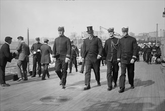 Cmdr. Waldo, R. Adm. Chas. Conard?, Lt. Cmdr. Halligan, and Lt. Cmdr. Sexton, between c1910-c1915. Creator: Bain News Service.