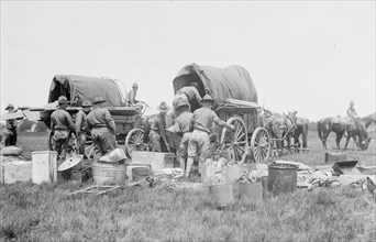 Unloading supplies, N.Y.N.G., between c1910 and c1915. Creator: Bain News Service.