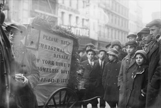 Collecting for Xmas, between c1910 and c1915. Creator: Bain News Service.