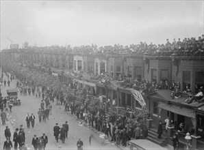 Fans on buildings outside Shibe Park, Philadelphia, during 1913 World Series (baseball), 1913. Creator: Bain News Service.