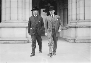 Governor Glynn leaving Capitol, Sec'y Tierney, 1913 or 1914. Creator: Bain News Service.