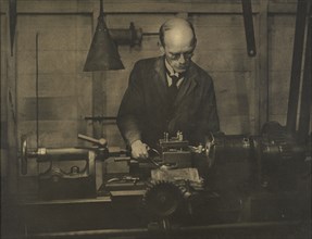 Untitled (Industry; man working lathe), 1920s. Creator: AJ Wales.