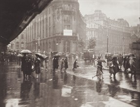 One of Londons wet days. From the album: Photograph album - London, 1920s. Creator: Harry Moult.