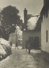 [Snow on roofs, back street]. From the album: Photograph album - England, 1920s. Creator: Harry Moult.