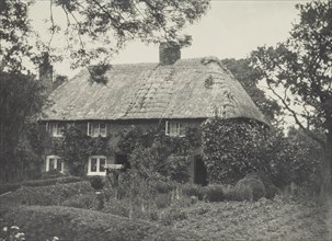 Thatched cottage. From the album: Photograph album - England, 1920s. Creator: Harry Moult.