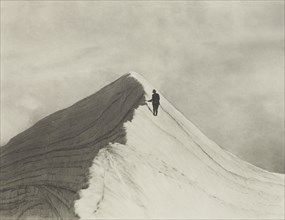 Traversing Annette wind ridge by chief guide F. Milne, Mt Cook district. From the album..., 1920s. Creator: Harry Moult.