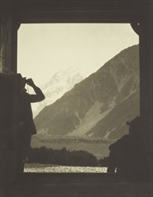 Mt Cook through the Hermitage doorway. From the album: Camera Pictures of New Zealand, 1920s. Creator: Harry Moult.