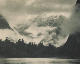 Mountain mists, Lake Ada, Milford Sound, 1920s. Creator: Harry Moult.