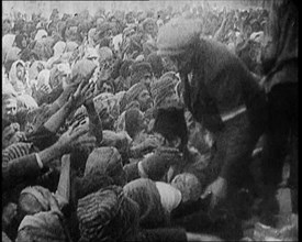 Greek People Jostling for Red Cross Food Hand Outs, 1922. Creator: British Pathe Ltd.