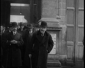 The French Prime Minister Aristide Briand Standing Outside with a Group of Male Civilians..., 1926. Creator: British Pathe Ltd.