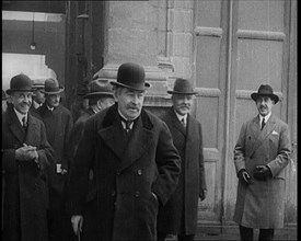 The French Prime Minister Aristide Briand Standing Outside with a Group of Male Civilians..., 1926. Creator: British Pathe Ltd.