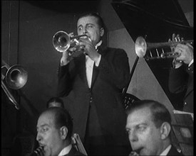 People Dancing to the Sounds of a Jazz Band in a Night Club, 1929. Creator: British Pathe Ltd.