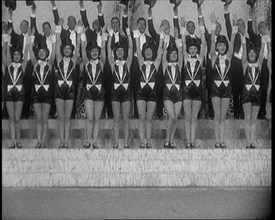 Scene from a Stage Show: a Large Dance Troop Tap Dancing on Steps in Top Hats, 1929. Creator: British Pathe Ltd.