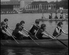 Young Female Civilians Wearing a Team Sport Outfit in a Rowing Race, an Audience Is Seen on..., 1920 Creator: British Pathe Ltd.