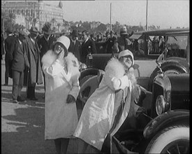 Two Female Civilians Wearing Glamorous Outfits Powdering Their Noses Using a Luxurious..., 1920. Creator: British Pathe Ltd.