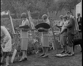 Female Civilians Outdoors Painting at Easels in an Art Class, 1920. Creator: British Pathe Ltd.