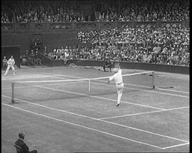 Two Male Civilians Playing a Match of Tennis at Centre Court at the All England Lawn Tennis..., 1920 Creator: British Pathe Ltd.