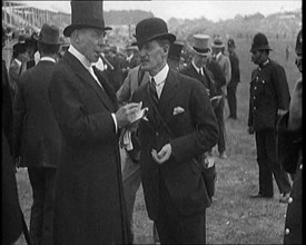 Hugh Cecil Lowther, 5th Earl of Lonsdale, Wearing a Top Hat Smoking a Cigar at a Horse racing Event, Creator: British Pathe Ltd.