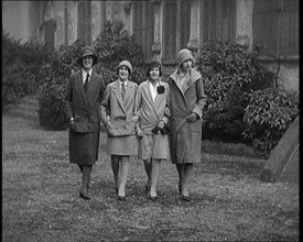 Female Civilians Wearing Glamorous Outfits and Wool Stockings Walking down a Street, 1920. Creator: British Pathe Ltd.