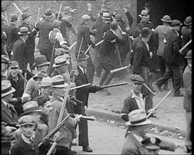 Small Crowd of American Civilians on a Demonstration/Strike in Conflict with the Police, 1930. Creator: British Pathe Ltd.