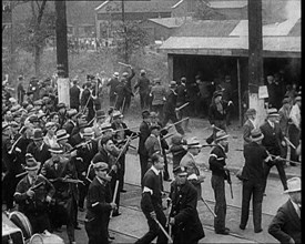 Small Crowd of American Civilians on a Demonstration/Strike in Conflict with the Police, 1930. Creator: British Pathe Ltd.