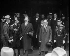 United States of America's President Herbert Clark Hoover Emerging from a Building with the..., 1930 Creator: British Pathe Ltd.