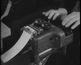 American Civilians Operating Stenotypes During the Lindbergh's Kidnapping Case Trial, 1930s. Creator: British Pathe Ltd.