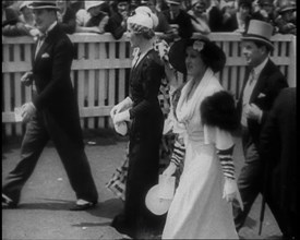 Well Dressed Men and Women at a Race Meeting, 1933. Creator: British Pathe Ltd.