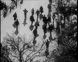 People Walking Around a Pavement, 1933. Creator: British Pathe Ltd.