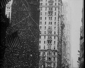 Building with American Flags in the Foreground, 1933. Creator: British Pathe Ltd.