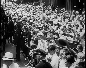 Crowd Watching a Procession, 1933. Creator: British Pathe Ltd.