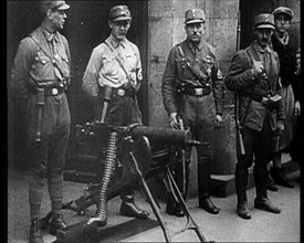 Uniformed Nazis Standing Next to a Machine Gun, 1933. Creator: British Pathe Ltd.