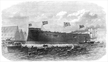 Our Iron-Clad Fleet: floating of Her Majesty's ship Hercules, at Chatham, 1868. Creator: Unknown.