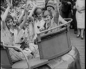 A Large Group of Female Civilians Enjoying  a Roller Coaster Ride, 1926. Creator: British Pathe Ltd.