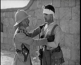 Scene from a Film: Male Actor Playing a Survivor from the Battle Being Questioned..., 1920s. Creator: British Pathe Ltd.