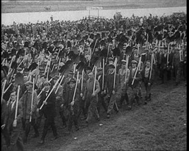 Parade of German Men with Spades and Shovels, 1933. Creator: British Pathe Ltd.