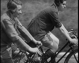 Large Group of Civilians Riding Bicycles Through Country Lanes, 1931. Creator: British Pathe Ltd.