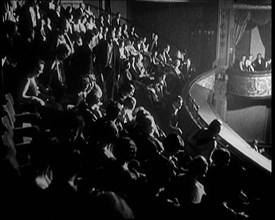 Audience Members taking Their Seats at a Show in London, 1922. Creator: British Pathe Ltd.