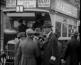 Volunteer Male Civilian Driving a Tram With a Police Escort Sitting Beside Him, 1926. Creator: British Pathe Ltd.