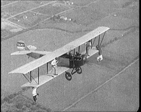 Jazz Musicians Playing from the Wing of a Biplane in the Air, 1921. Creator: British Pathe Ltd.