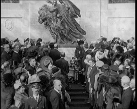 French and British Crowd Watching as a Union Flag and Tricolore Are Removed to Reveal..., 1920. Creator: British Pathe Ltd.