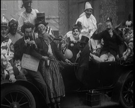 British Students in Fancy Dress Costumes Playing About at a Rag Event, 1920. Creator: British Pathe Ltd.